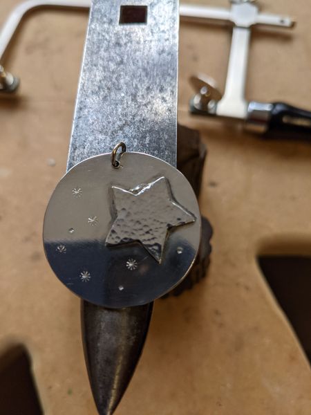 Silver star and moon pendant