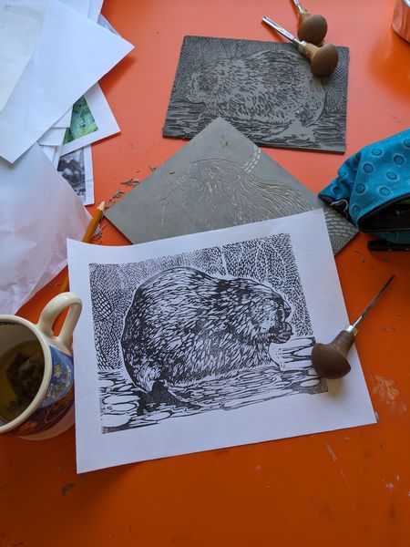 Showing carving tools and a printed block 
