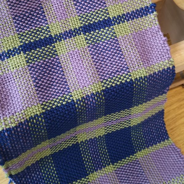 purple, green, and navy handwoven scarf