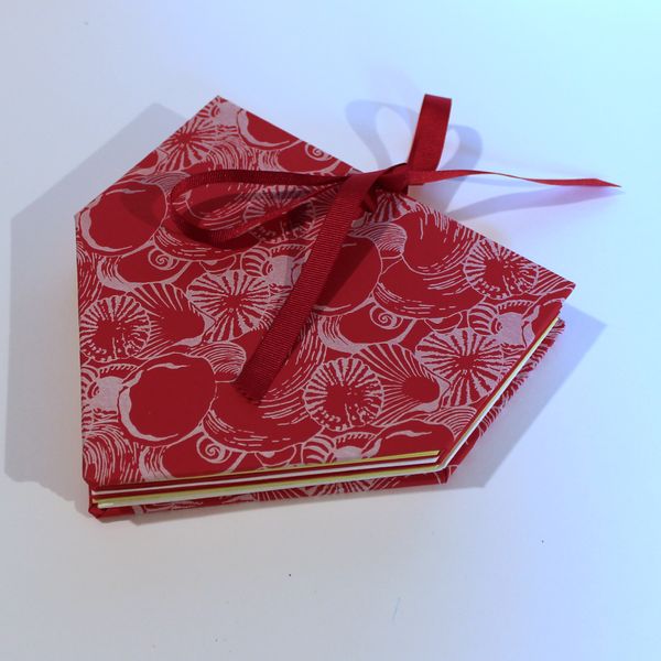 map fold book closed with ribbon tie