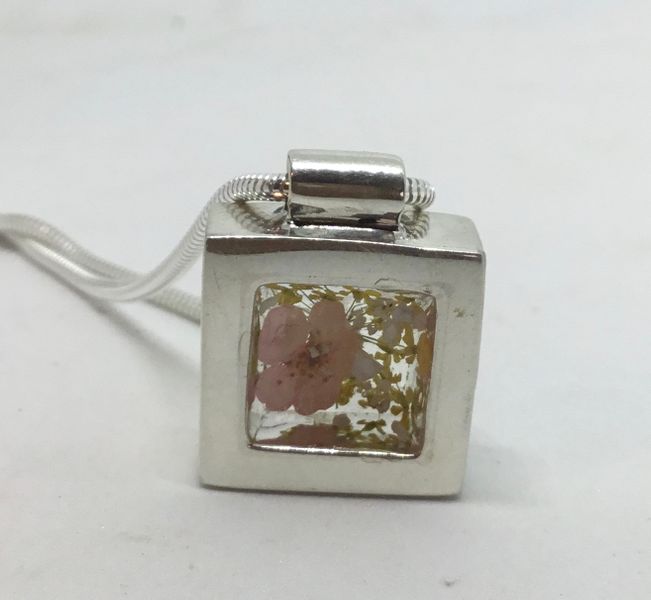 Beautiful handmade square pendant set with pressed flowers 