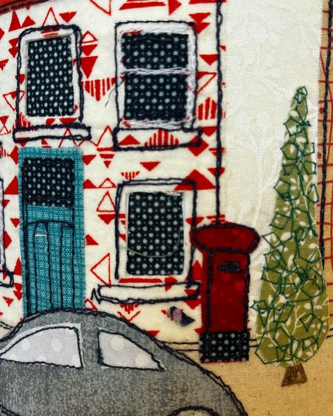 Detail of Home Sweet Home free machined and appliqued lampshade