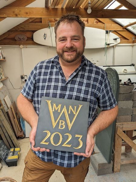 Carved and gilded date plaque