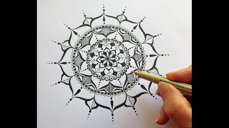 Learn to draw this mandala design.