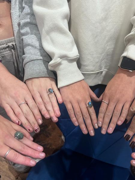 Learners wearing the rings they have made on their hands