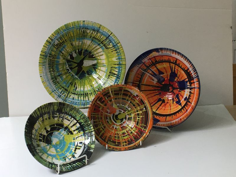 Pots made and painted on the wheel