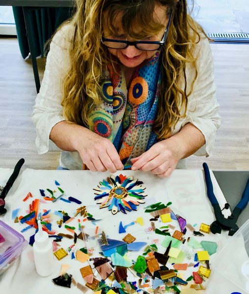 Michaela making her sunflower mosaic