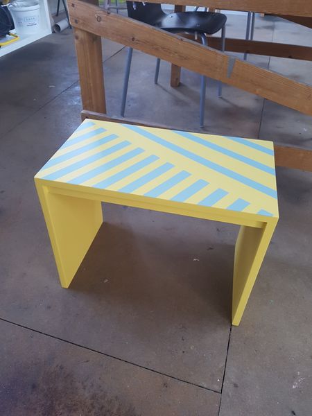 Vibrant design on an upcycled table