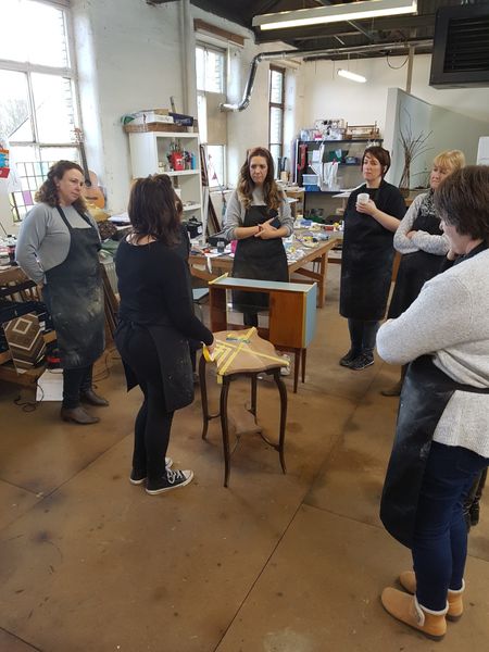 Nicky from Done up North demonstrating masking tape designs on the furniture upcycling workshop