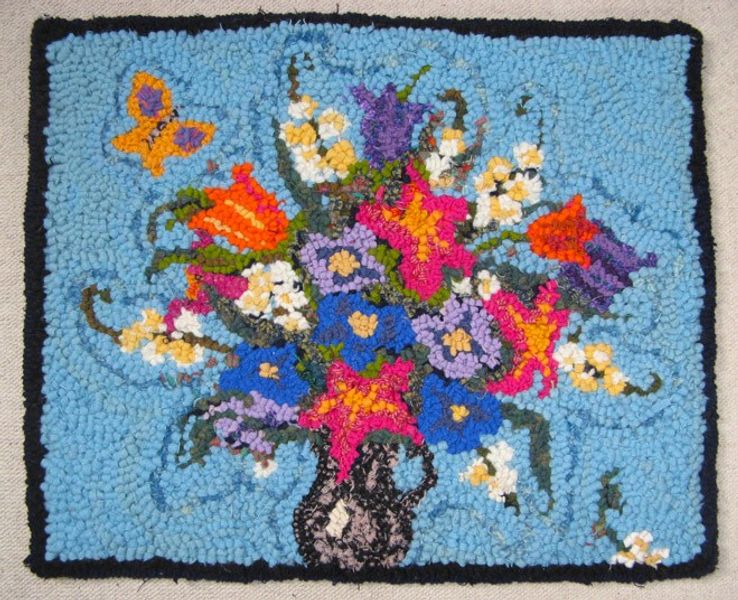 Hooked woollen rug
