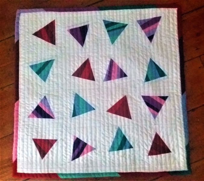 Tumbling triangles.  Matchstick quilting