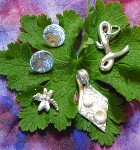 A handful of silver leaves fresh from the kiln  Art clay silver, Precious  metal clay jewelry, Precious metal clay