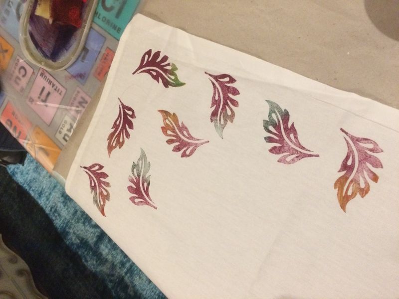 Mixed autumnal colours on this tea towel