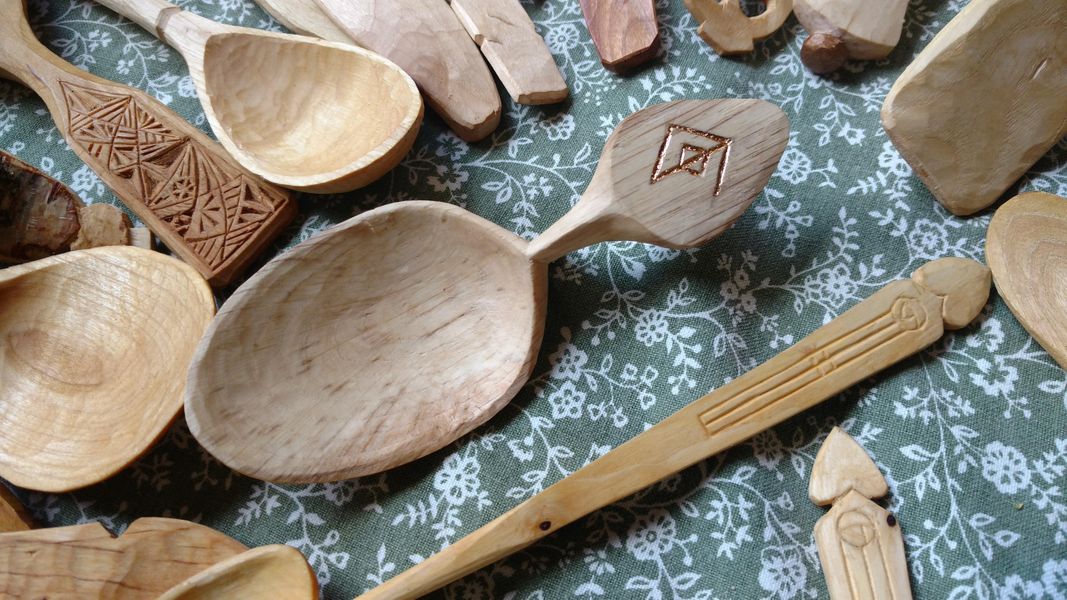 Gold leaf inlaid in chip carved runes