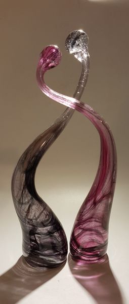 intertwining sculptural piece done by a couple.