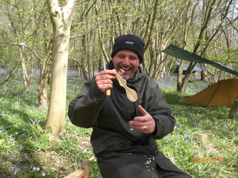 Carving a spoon in the woods