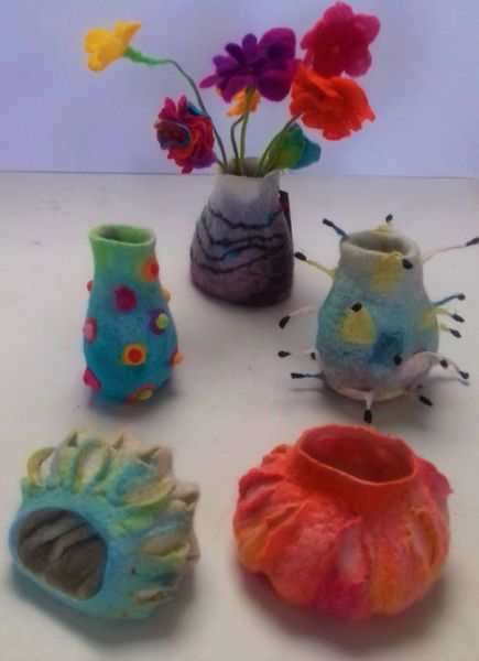 Felt Vessels for tea lights and vases.