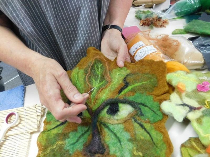 Sculpting the Green man.