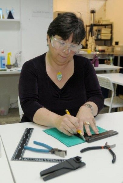 Jane demonstrating glass cutting on glass fusing taster day in Margate