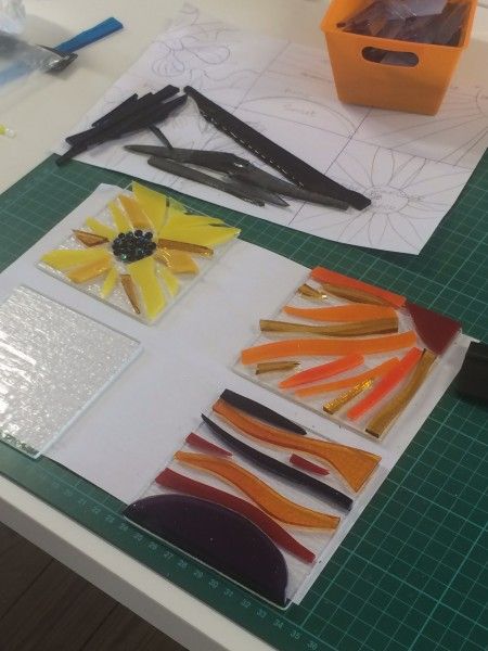 Student making mini wall panels on a glass fusing taster day