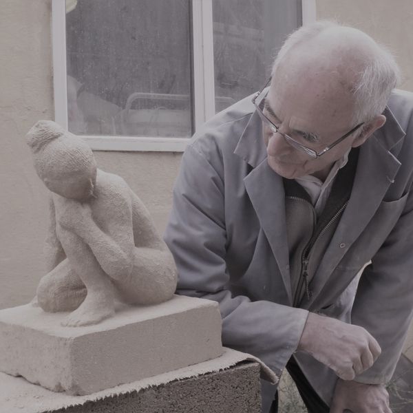 Pete with his kneeling fiure in Bath stone