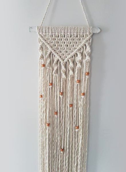 A finished macrame wall hanging
