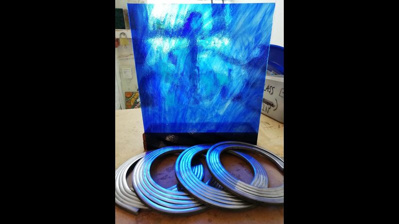 Dreamy blue glass and lead coils