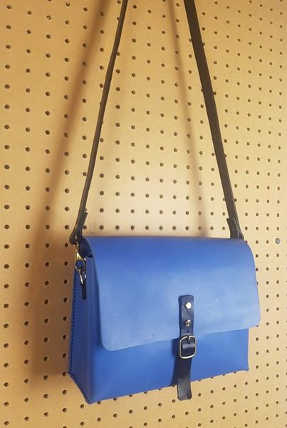 Blue cross body flap and buckle satchel