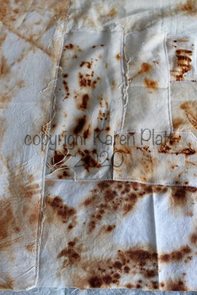 Rust dyed fabric quilt