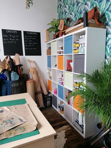 Our studio shelves filled with dyes, paints and design goodies!