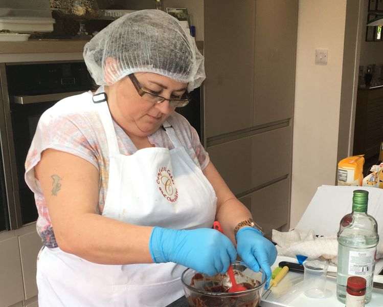 Student making dark chocolate ganache