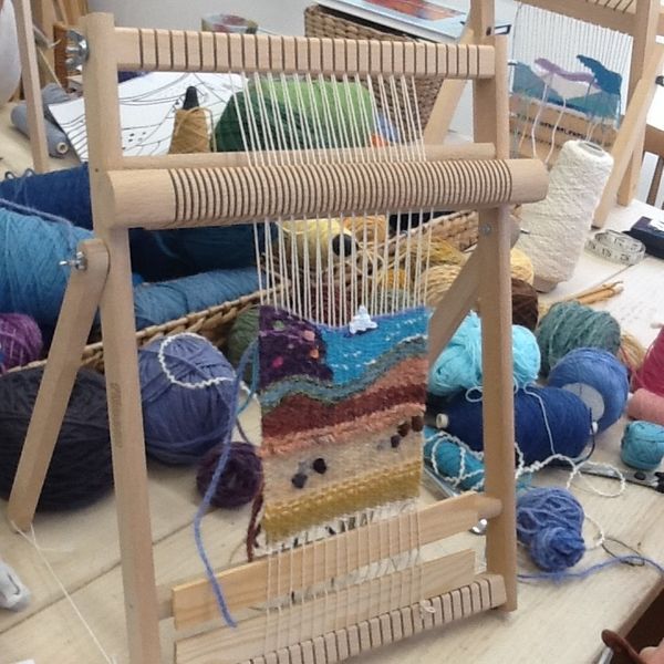 LYL Student working on loom