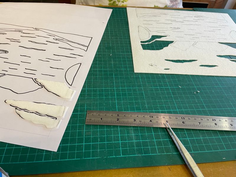Cutting fibre paper for a coastal inspired plate.