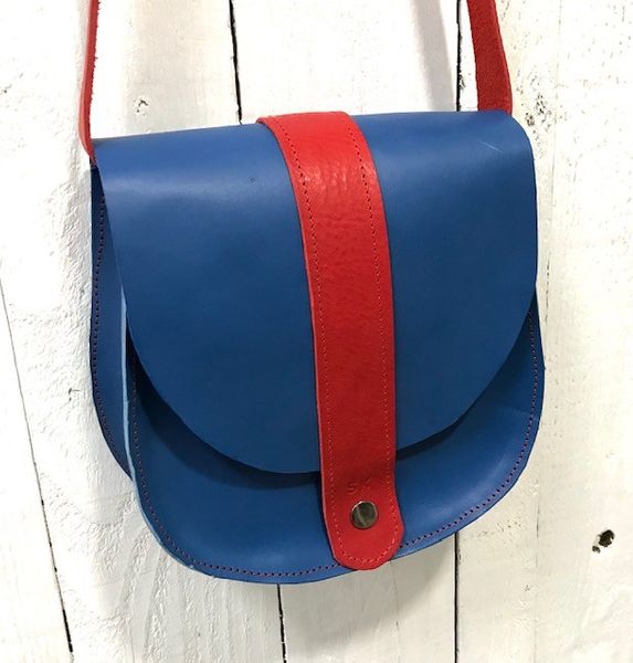 Blue and red leather saddle bag