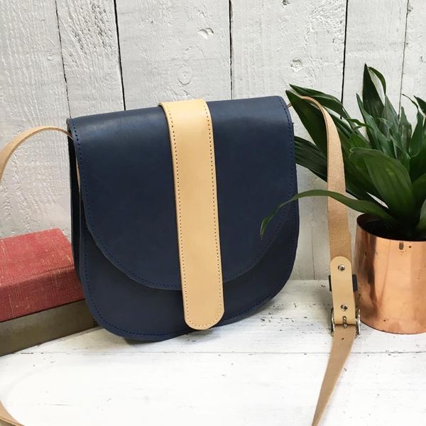 Blue and beige leather saddle bag