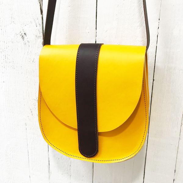 Canary yellow and brown leather saddle bag