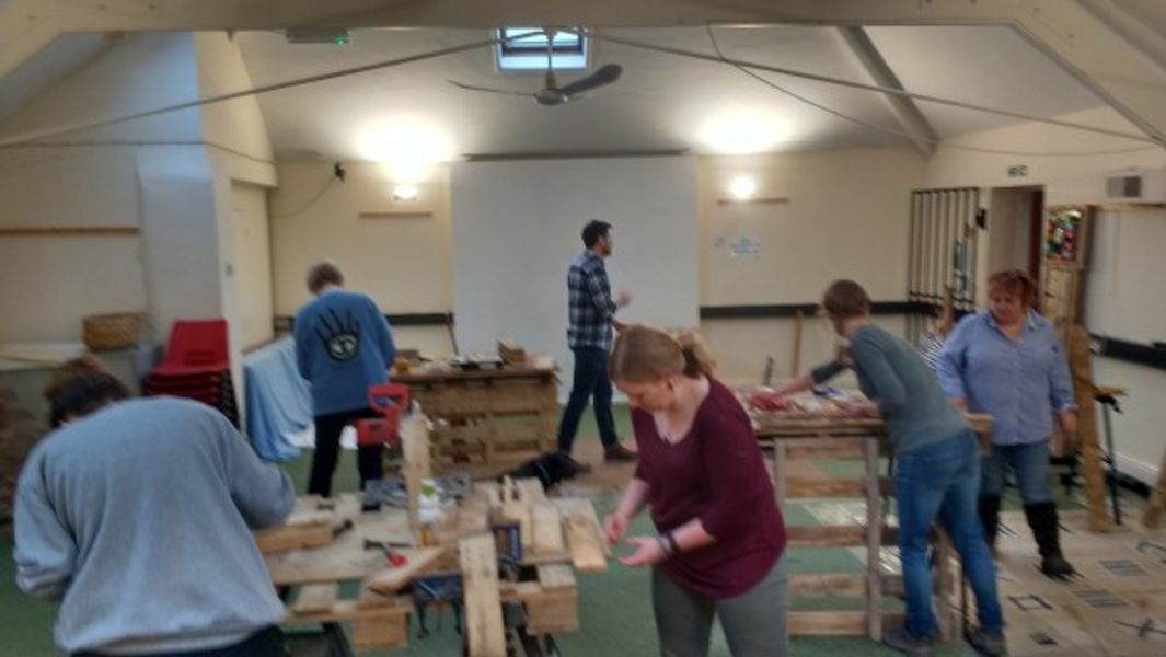 hard at work making amazing things with pallets