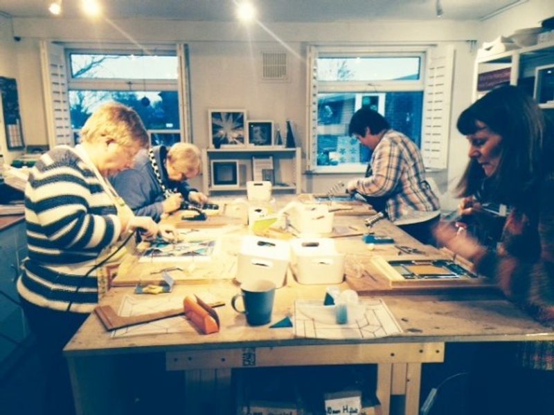 Students on the "Making a stained glass light catcher" workshop