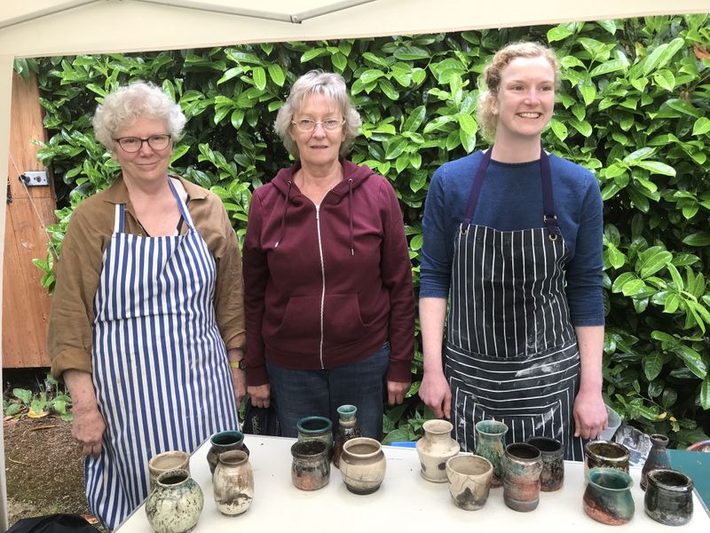 Students with their finished pots