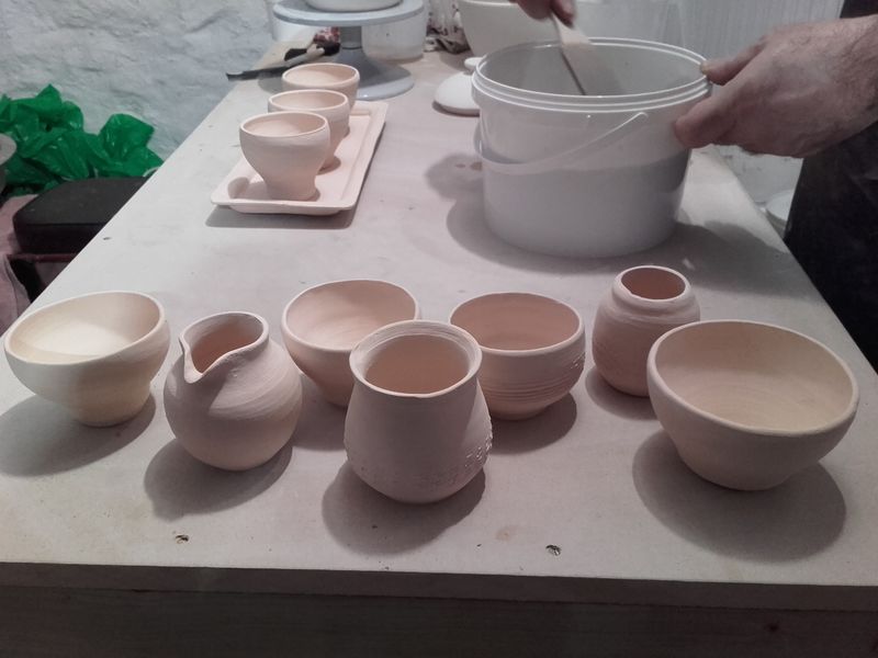 Pots being glazed