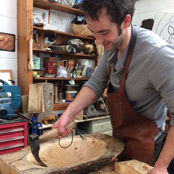 Adze work on a dish.Hand tool use to carve hollow forms with Jason Turpin-Thomson in Sheffield.