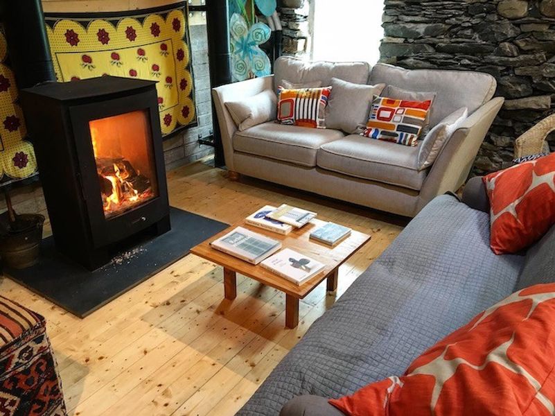 Cosy up by the fire and browse some art books or have a chat over coffee