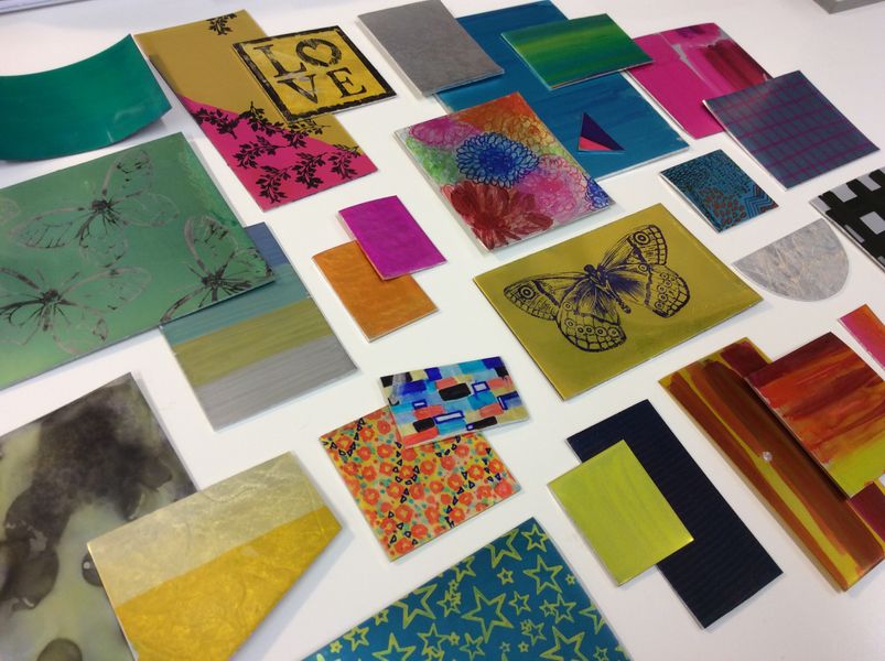 Coloured metal samples by students, now ready to be cut and shaped into jewellery