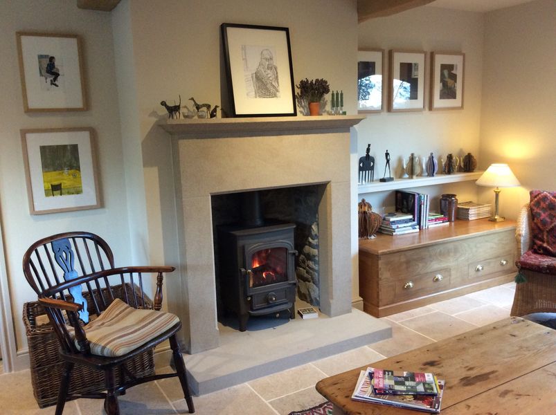 A comfortable spot by the wood burner.