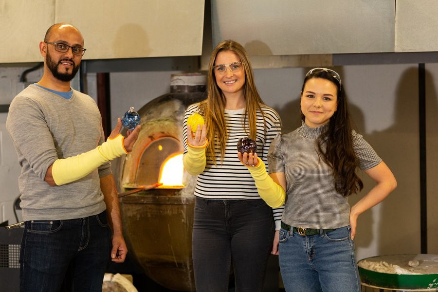 Blown glass baubles made at blowfish glass making experiences