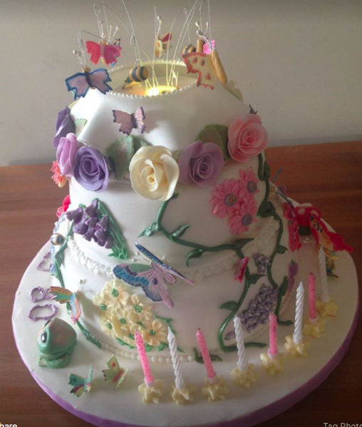 My Great Aunts 80th Birthday cake including some moulded flowers that I can show you how to make.