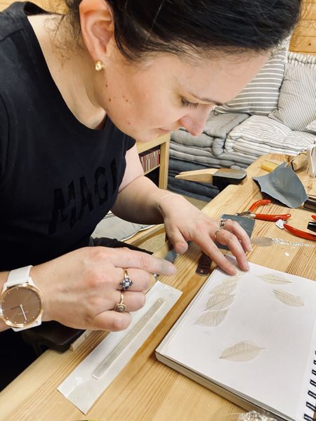Designing leaf embossed silver torque bracelet in preparation for rolling mill