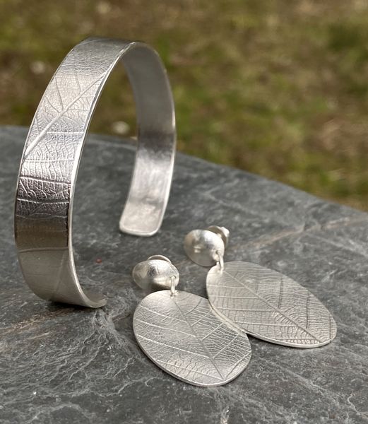 Leaf embossed silver bracelet and earring set created by a complete beginner on 1 day course