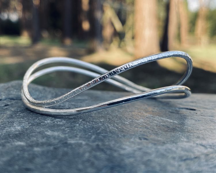 Double infinity bangle made on 1 day jewellery course by Stephie
