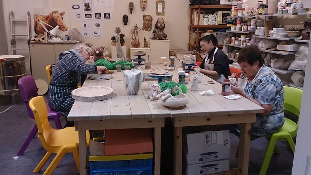 Class working at Paula Armstrong Ceramics